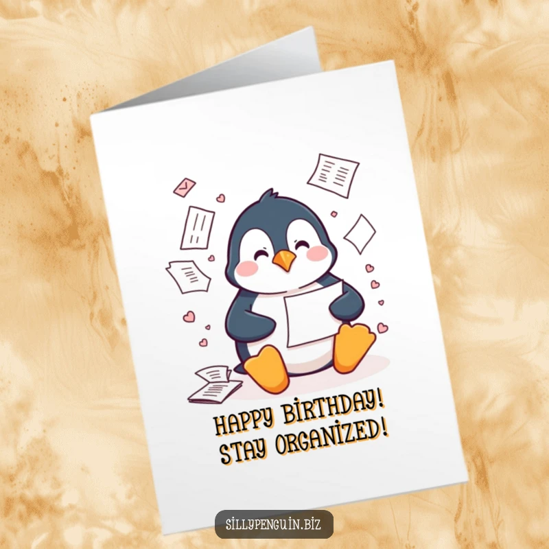 Funny Free Printable Birthday Card: A penguin uses its beak to file papers, creating a delightful paper storm.