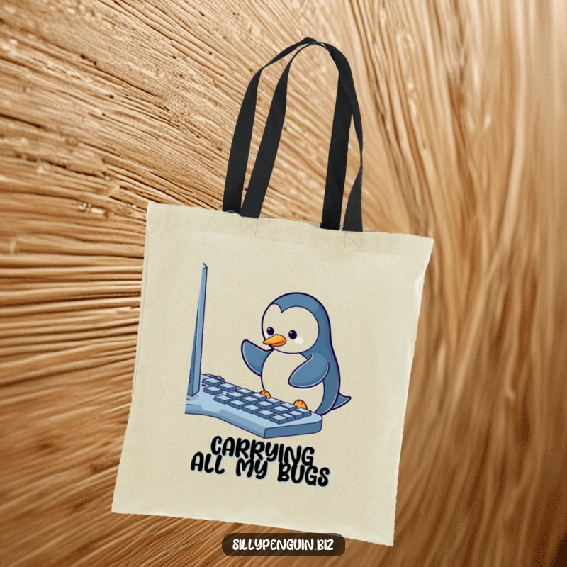Funny Tote Bag: Penguin Struggling to Type on a Keyboard with One Key Jammed, a humorous office scene